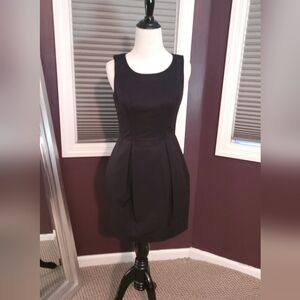 Chic Black Sleeveless Little Black Dress With Tulip Skirt